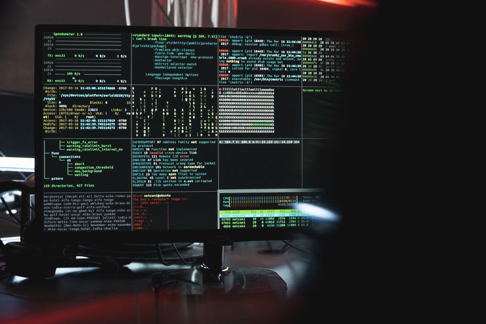 Stylized illustration of a face inside a digital screen with code overlays, representing deepfake video